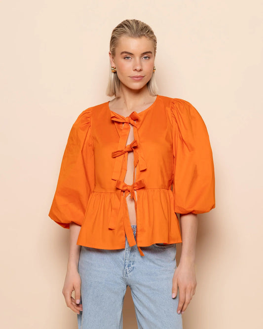LOLA - TOP ABULLONADO NARANJA