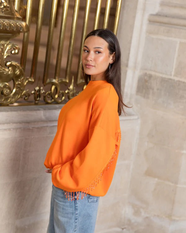 CHLOE - JERSEY OVERSIZE NARANJA CON FLECOS